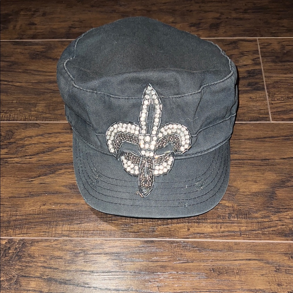 Embellished Black Cap with Fleur-de-Lis Design